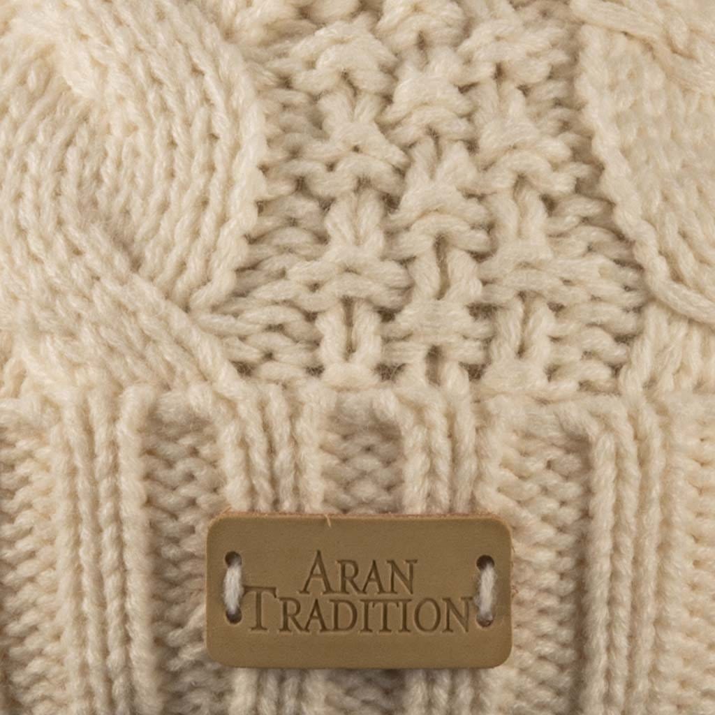 Stay Cozy & Chic with Aran Cable Pom Pom Hat | Traditional Cable Knit